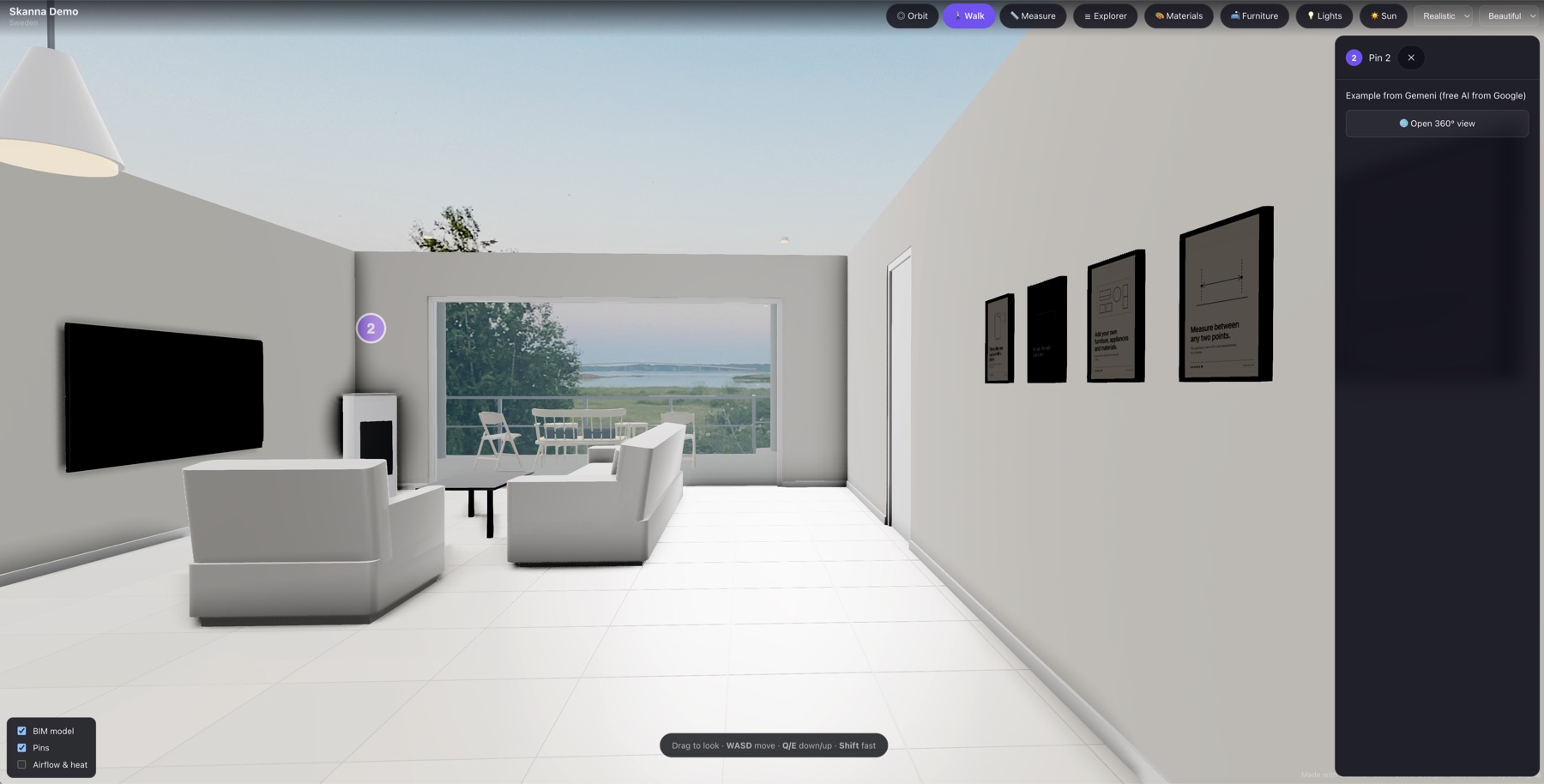 A pin on the living room wall of the twin, its panel offering to open a 360 degree view of the room, with the furnished living space and the sea beyond the glazing behind it