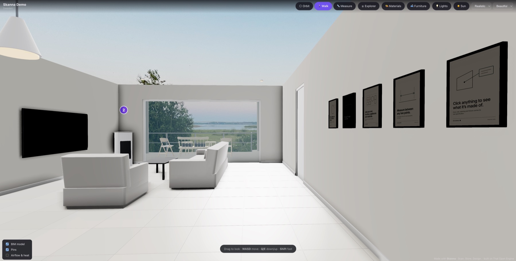 First-person walk mode inside a digital twin, standing in the living space and looking out through full-height glazing to a terrace and the sea